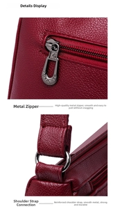 Detailed macro view of the wine red litchi leather grain and durable metal zipper pulls