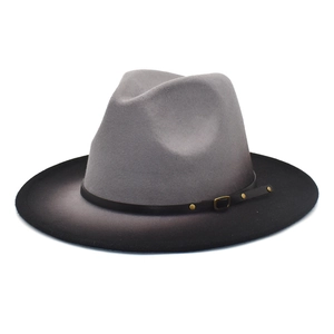 Detail of grey gradient felt fedora hat featuring black leather band and gold buckle