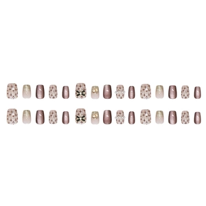 Faux ongles œil-de-chat marron avec nœud, perles et paillettes couleur champagne