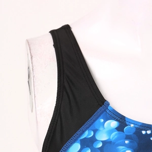 Macro detail of high-elasticity shoulder strap and precise stitching on athletic swimsuit