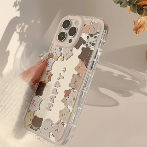 Cute mirror iPhone case with cartoon cats and Happy text design in a soft natural setting
