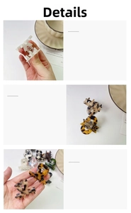 Detailed macro view of minimalist acetate hair claws in tortoise shell and beige colors
