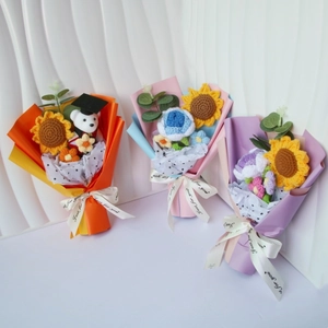 Three handcrafted crochet flower bouquets with graduation bear and Just For You ribbons