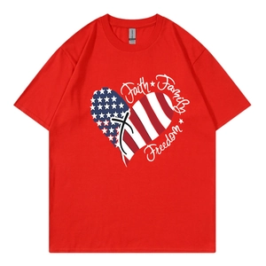 Detailed view of red cotton T-shirt featuring patriotic heart graphic and Faith text
