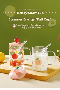 Detail of glass straw mug with 3D strawberry lid and fruit print on high borosilicate glass