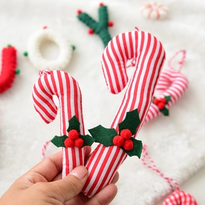 Christmas striped candy cane fabric ornaments with red berries for tree decoration