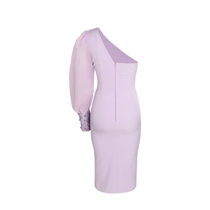 Detail of lilac one-shoulder dress showing sheer chiffon sleeve and sequined cuff detail