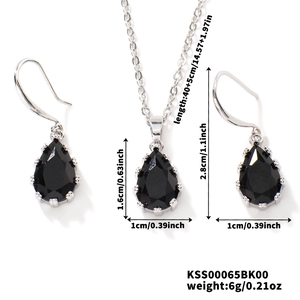 Detailed view of black teardrop jewelry set with necklace and earrings size measurements