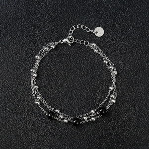 Three-layer stainless steel beaded bracelet with silver chains and black beads for women