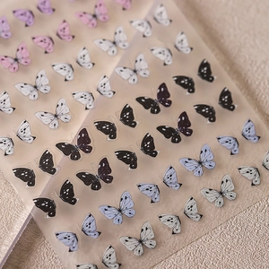 Stereoscopic 3D butterfly nail art stickers in pink and purple for DIY manicure design