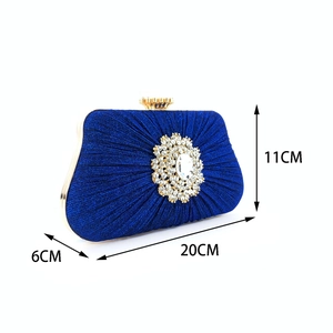 Blue pleated satin clutch with floral crystal clasp and 20x11x6CM dimensions