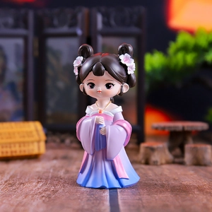 Detail of Q-version doll in purple and pink Hanfu with blurred vintage background