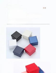 Detailed macro view of square jewelry boxes with diamond pattern in multiple colors