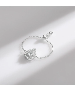 Detail of S925 silver chain ring featuring a pear-shaped diamond and adjustable ball