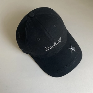 Detailed embroidery of white Dashing lettering and checkered star on black cotton cap
