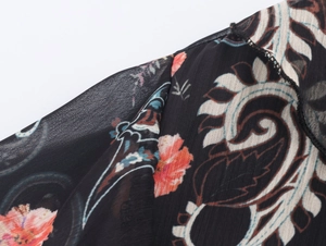 Detail shot of lightweight chiffon fabric with vintage paisley and floral patterns