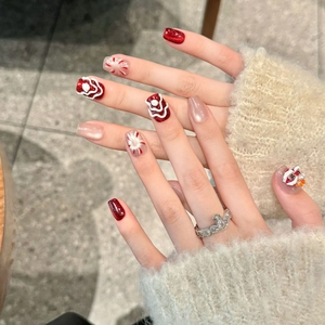 Handmade Chinese New Year red lion dance press-on nails with 3D embossed art and glitter