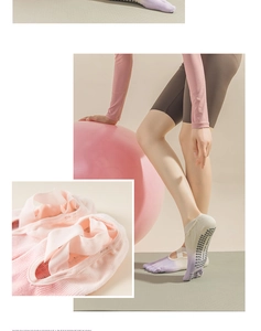 Close-up of non-slip yoga socks with five-toe design and pink gradient ribbon straps