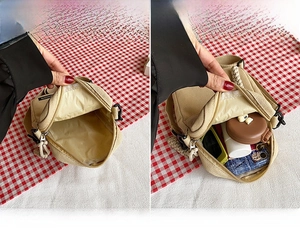 Capacity demonstration of the mini canvas crossbody bag showing inner storage space