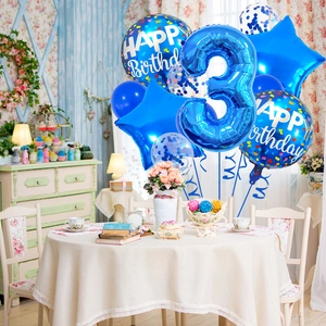 Close-up of blue number 3 foil balloon with star and confetti balloons for birthday parties