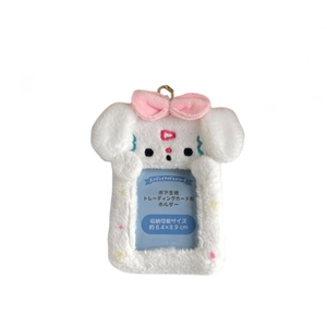 Cute white plush puppy card holder with pink bow and gold keychain on white background