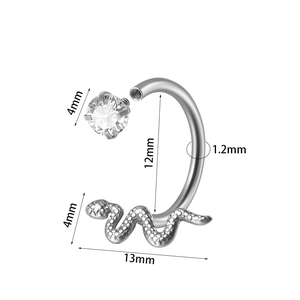 Detail of horseshoe lip ring with 4mm zircon and snake design showing size measurements