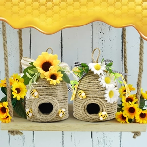Hanging woven hemp rope beehive ornaments with sunflowers and daisies for spring garden decor