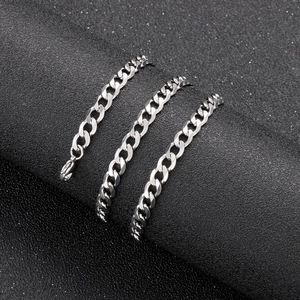 Polished silver stainless steel Cuban link chain necklace in minimalist hip-hop style