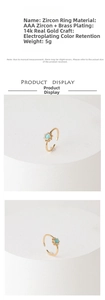 Detailed view of sunburst zircon ring in 14k gold plated brass with light blue gemstone