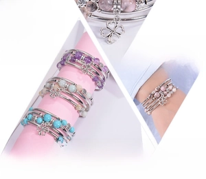 Multi-layer natural stone wrap bracelet featuring pink zebra jasper and flower charm