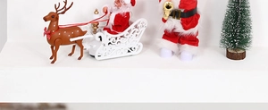 Detail of animated Santa Claus on a white reindeer sleigh with saxophone musical toy