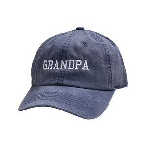 Close-up detail of white Grandpa embroidery on vintage blue washed denim baseball cap