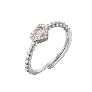 Detail of adjustable heart ring with pink cubic zirconia and beaded silver band