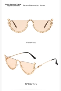 Macro detail of brown rhinestones on gold semi-rimless cat eye fashion sunglasses