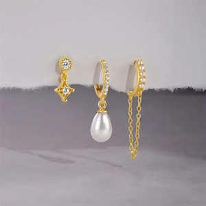 Detailed close-up of S925 silver petal pearl earrings with tassels and zircon stones