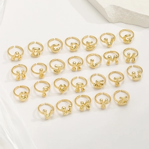 Polished 18K gold adjustable open rings featuring chunky bubble alphabet letter designs
