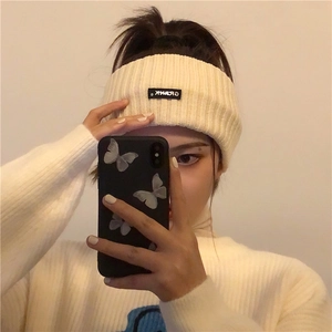Knitted wide cream headband with black logo label for sport and washing face