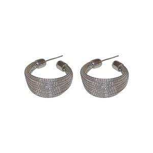 Silver geometric textured hoop earrings with a wide mesh-style metal weave design
