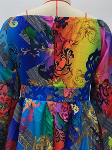 Detail of the back zipper and high-waist cut on this Baroque print satin dress
