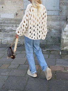 Pull chic en maille ajourée crème pour femme avec coupe ample décontractée et manches longues
