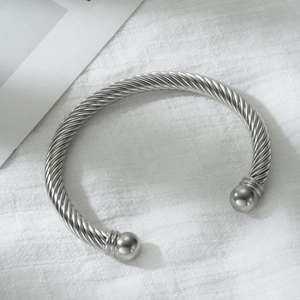 Silver twisted rope open cuff bracelet with spherical ends in polished stainless steel