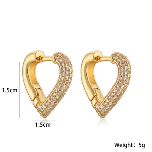 Exquisite gold-plated heart earrings with clear cubic zirconia stones on white background