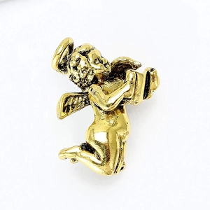 Detailed view of a vintage gold alloy angel brooch featuring wings and a halo finish