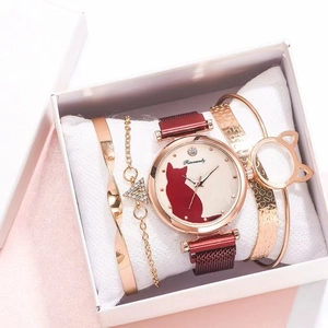 Close-up of women's quartz watch and bracelet set with red cat motif in a gift box