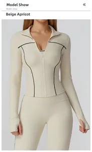 Slim-fit apricot yoga jacket with contrast stitching and thumbhole sleeve details