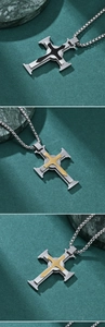 Detailed macro view of multi-layered cross pendant with gold and black metal accents