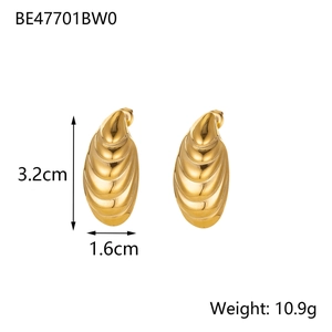 Detail view of 14K gold plated stainless steel oval earrings with textured wavy design