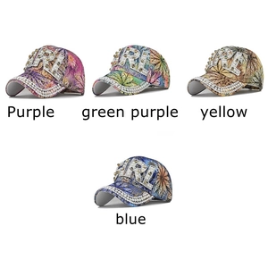 Floral baseball cap with rhinestone GIRL lettering and pearl trim in four colors