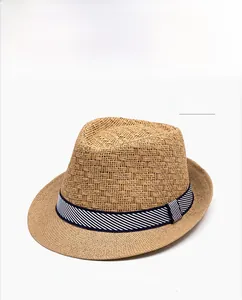 Top view of khaki woven straw fedora hat with navy striped ribbon for summer sun protection