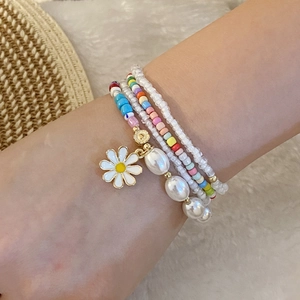 Handmade colorful seed bead bracelet set with white pearl and daisy enamel pendant charms